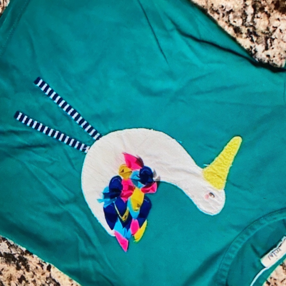 Vibrant bird graphic short sleeve blouse